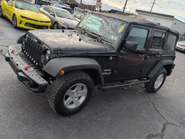 used 2012 Jeep Wrangler Unlimited car, priced at $13,200