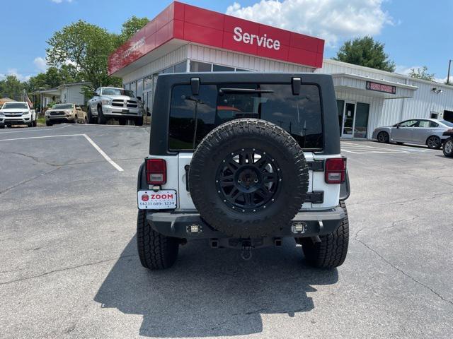 used 2015 Jeep Wrangler Unlimited car, priced at $19,850