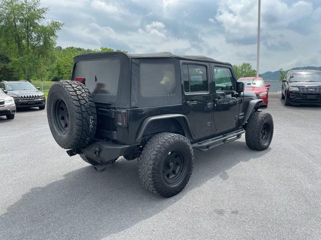 used 2015 Jeep Wrangler Unlimited car, priced at $14,700