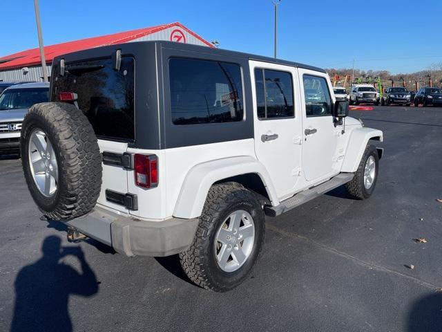 used 2011 Jeep Wrangler Unlimited car, priced at $12,950