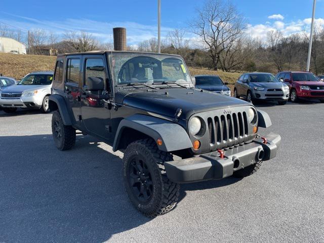 used 2013 Jeep Wrangler Unlimited car, priced at $12,900