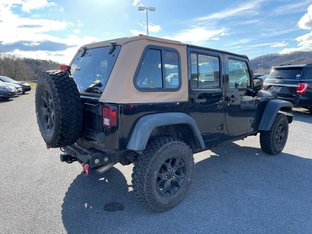 used 2013 Jeep Wrangler Unlimited car, priced at $12,900