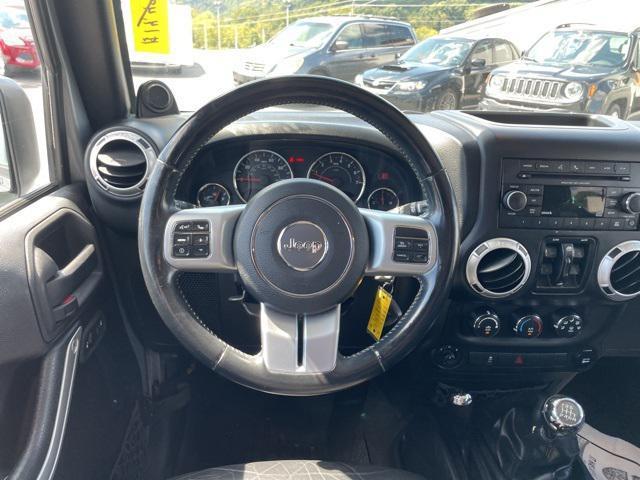 used 2014 Jeep Wrangler Unlimited car, priced at $13,900