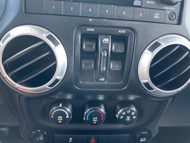 used 2014 Jeep Wrangler Unlimited car, priced at $13,900