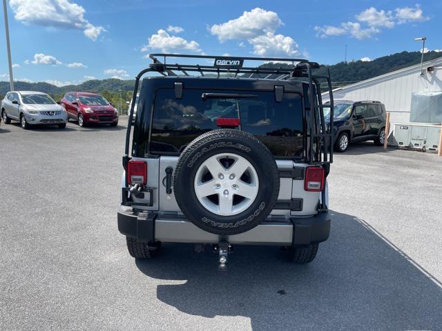 used 2014 Jeep Wrangler Unlimited car, priced at $13,900