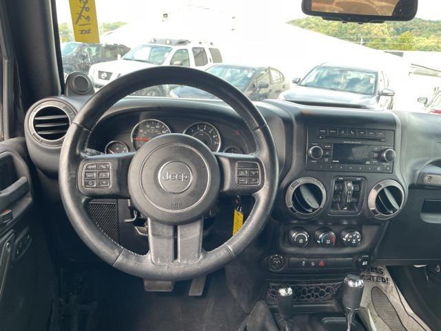 used 2013 Jeep Wrangler Unlimited car, priced at $12,450