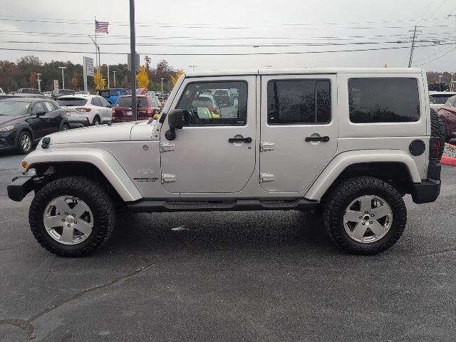 used 2011 Jeep Wrangler Unlimited car, priced at $12,950