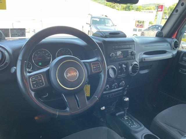 used 2013 Jeep Wrangler Unlimited car, priced at $13,900
