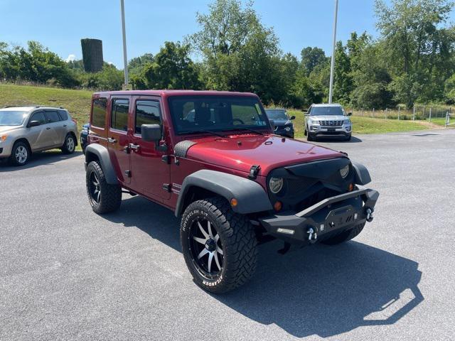 used 2013 Jeep Wrangler Unlimited car, priced at $13,900