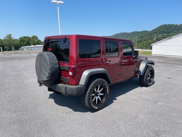 used 2013 Jeep Wrangler Unlimited car, priced at $13,900