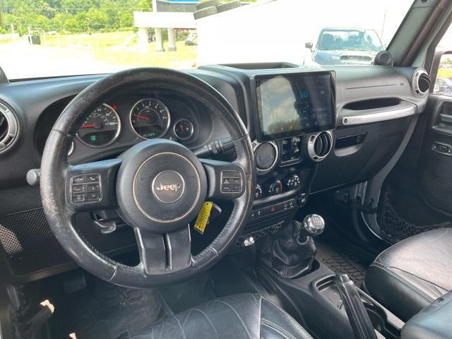 used 2014 Jeep Wrangler Unlimited car, priced at $13,990