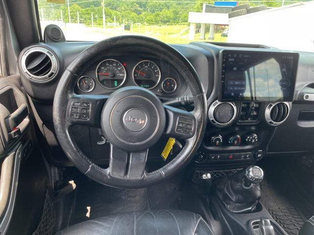 used 2014 Jeep Wrangler Unlimited car, priced at $13,990