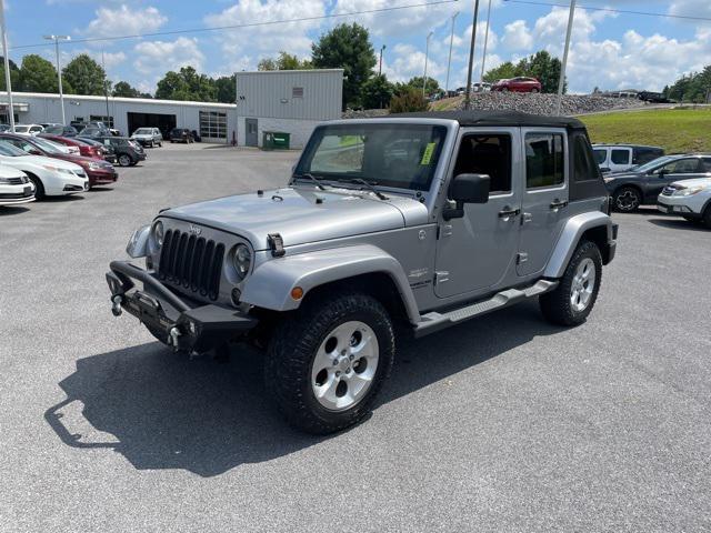 used 2014 Jeep Wrangler Unlimited car, priced at $13,990
