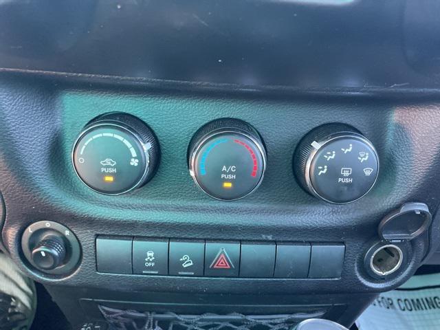 used 2015 Jeep Wrangler Unlimited car, priced at $13,900