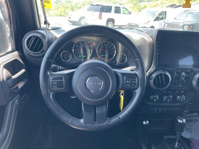used 2015 Jeep Wrangler Unlimited car, priced at $13,900