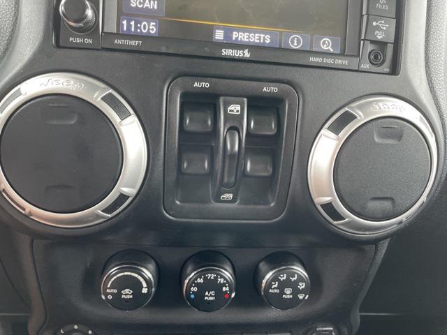 used 2013 Jeep Wrangler Unlimited car, priced at $14,750