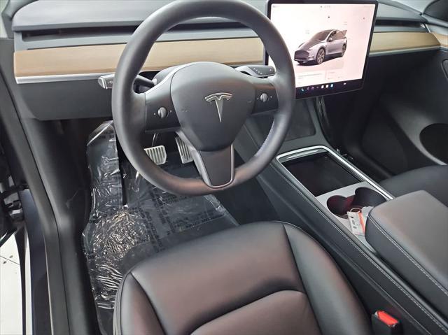 used 2023 Tesla Model Y car, priced at $34,816