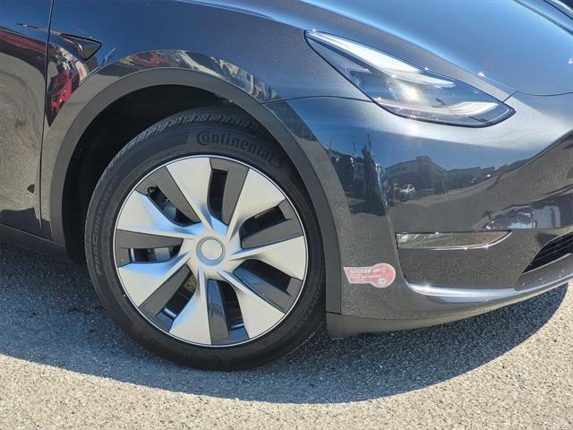 used 2024 Tesla Model Y car, priced at $36,795