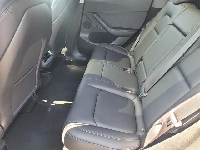 used 2024 Tesla Model Y car, priced at $36,795