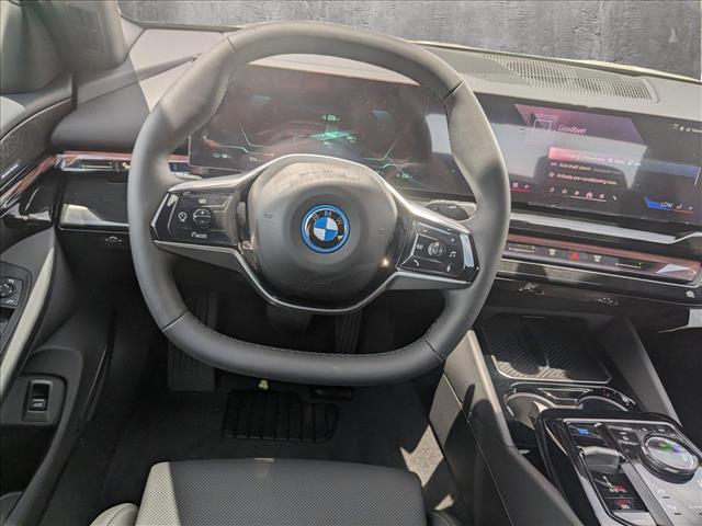 new 2025 BMW i5 car, priced at $77,395