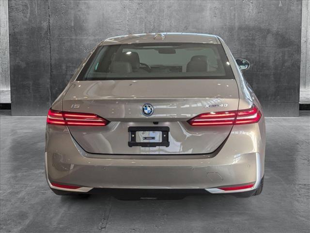 used 2025 BMW i5 car, priced at $64,999