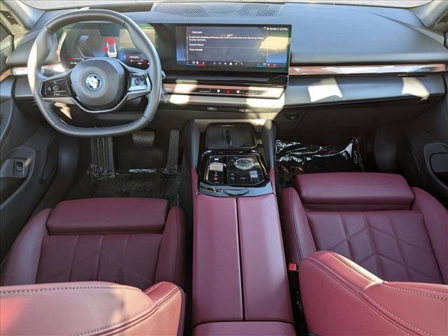 used 2024 BMW i5 car, priced at $48,777