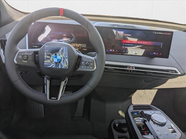 new 2025 BMW iX car, priced at $117,585