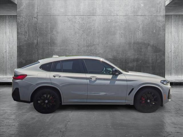 used 2022 BMW X4 car, priced at $52,980