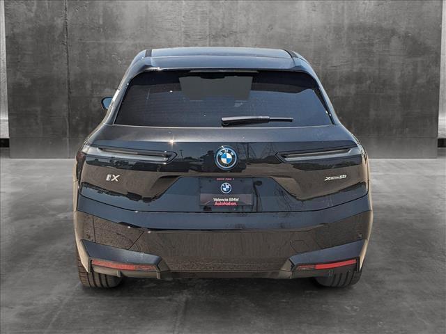 new 2025 BMW iX car, priced at $97,340