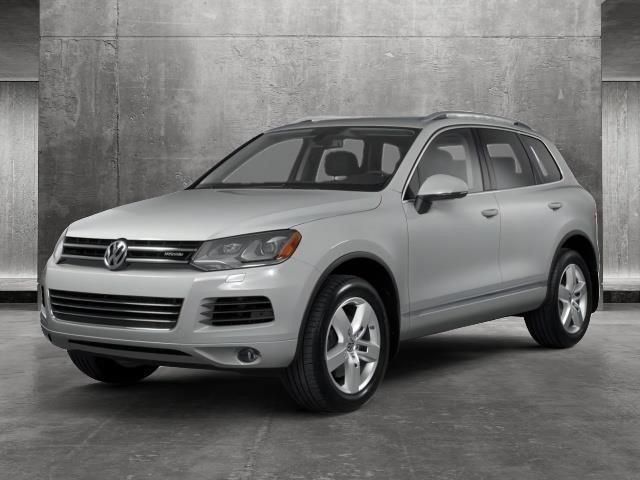 used 2013 Volkswagen Touareg Hybrid car, priced at $12,991