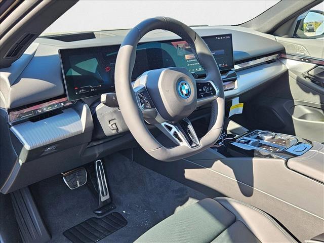 new 2026 BMW 550e car, priced at $82,995