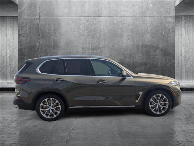 used 2024 BMW X5 PHEV car, priced at $59,999