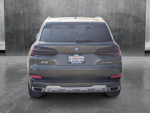 used 2024 BMW X5 PHEV car, priced at $59,999