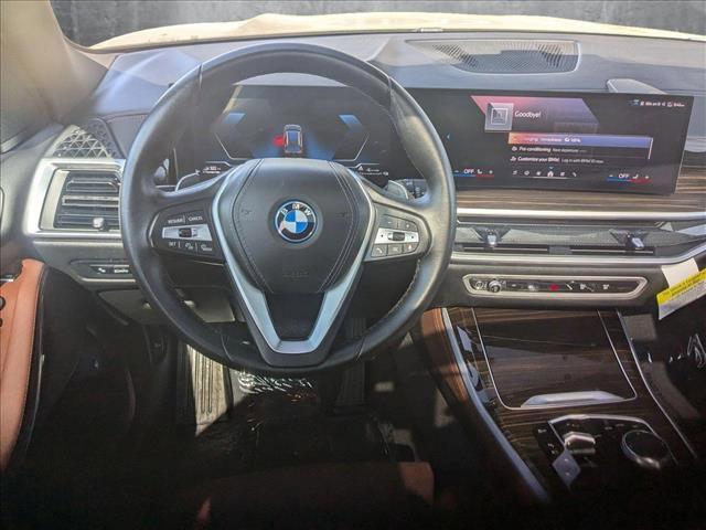 used 2024 BMW X5 PHEV car, priced at $59,999