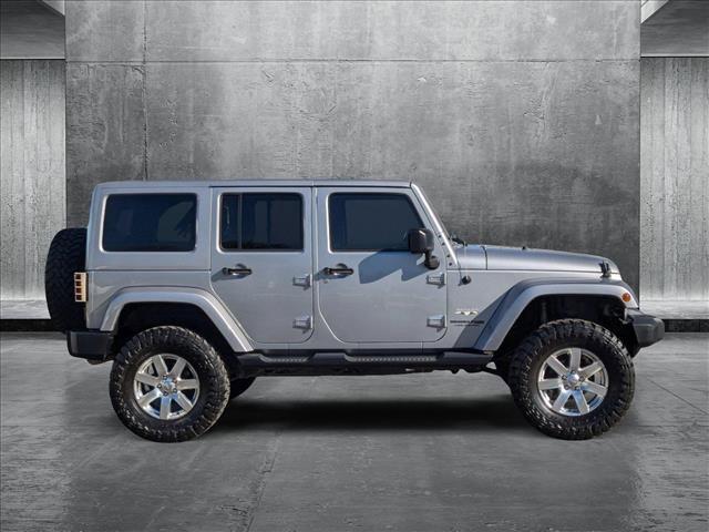 used 2018 Jeep Wrangler JK Unlimited car, priced at $21,992