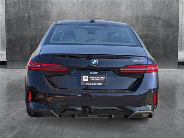 new 2025 BMW 530 car, priced at $67,595