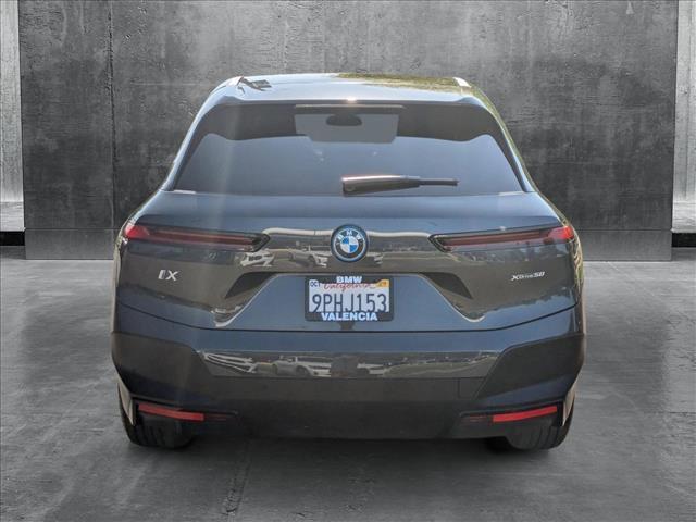 used 2025 BMW iX car, priced at $71,596
