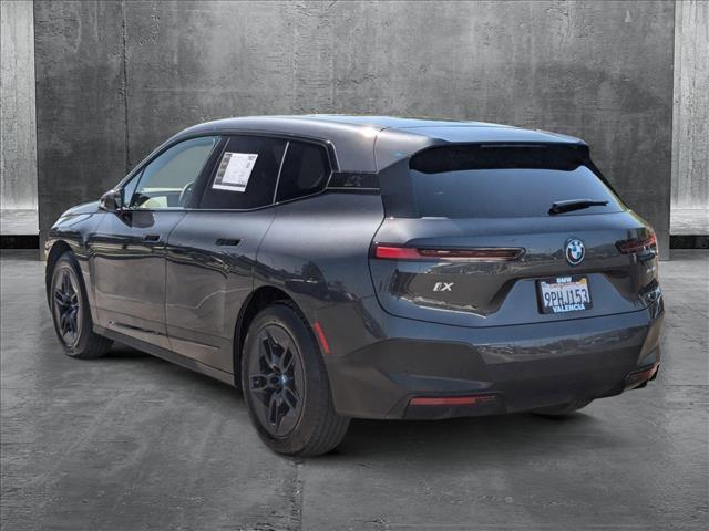 used 2025 BMW iX car, priced at $71,596