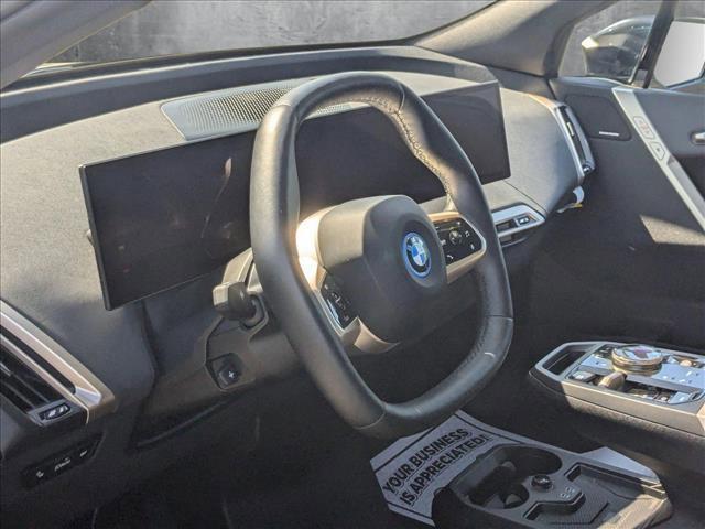 used 2025 BMW iX car, priced at $71,596