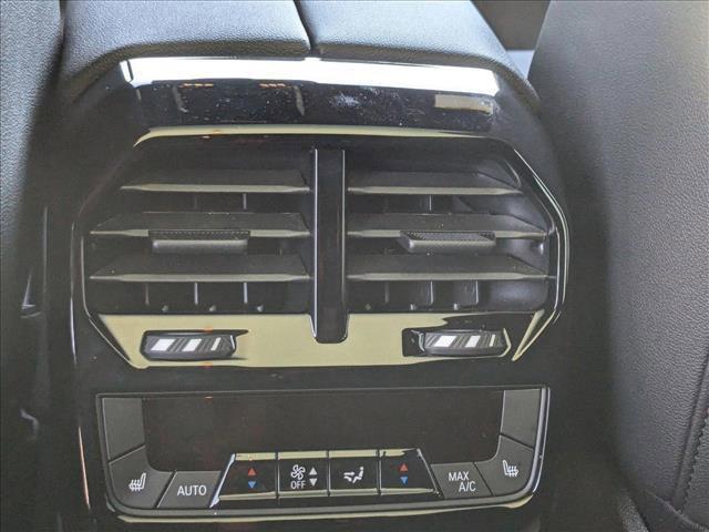 used 2025 BMW iX car, priced at $71,596