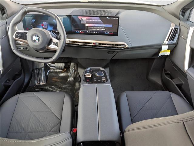new 2026 BMW iX car, priced at $95,050