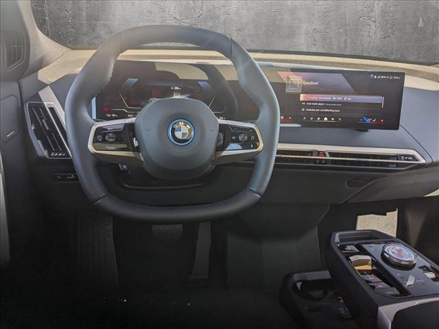 new 2025 BMW iX car, priced at $94,095