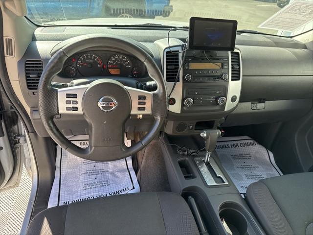 used 2015 Nissan Frontier car, priced at $13,500