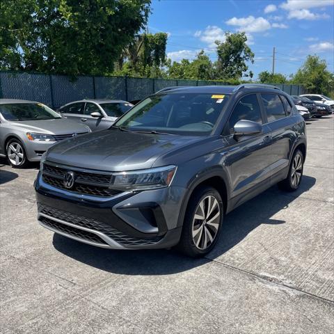 used 2023 Volkswagen Taos car, priced at $21,377