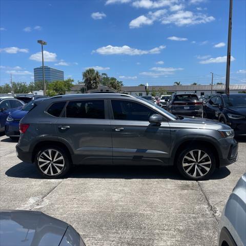 used 2023 Volkswagen Taos car, priced at $21,377