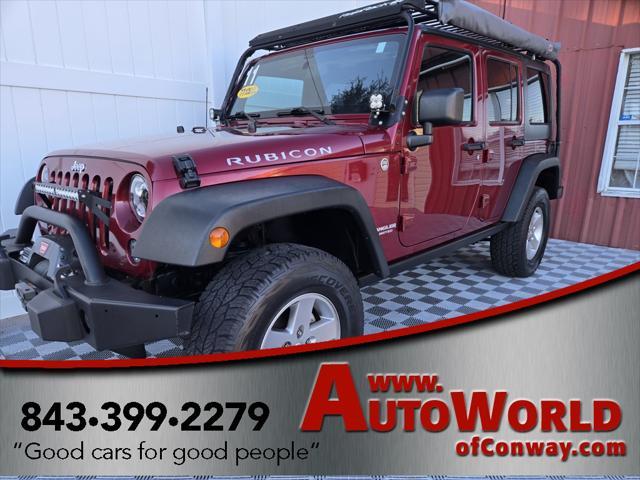 used 2011 Jeep Wrangler Unlimited car, priced at $22,150