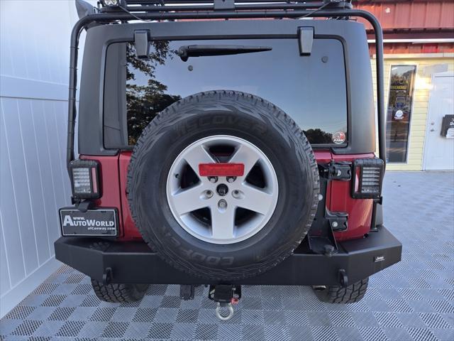 used 2011 Jeep Wrangler Unlimited car, priced at $22,150