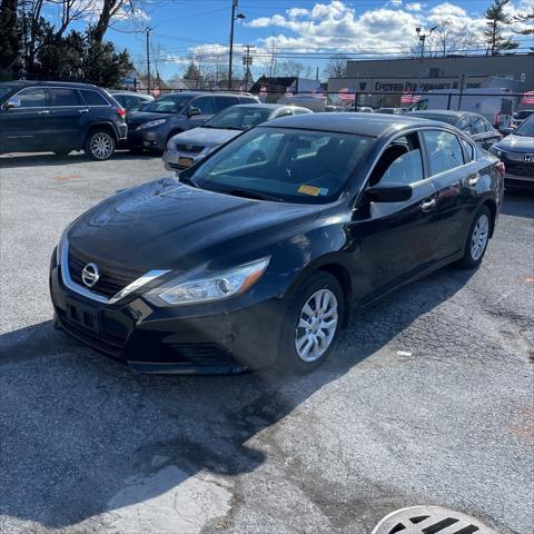 used 2018 Nissan Altima car, priced at $15,000