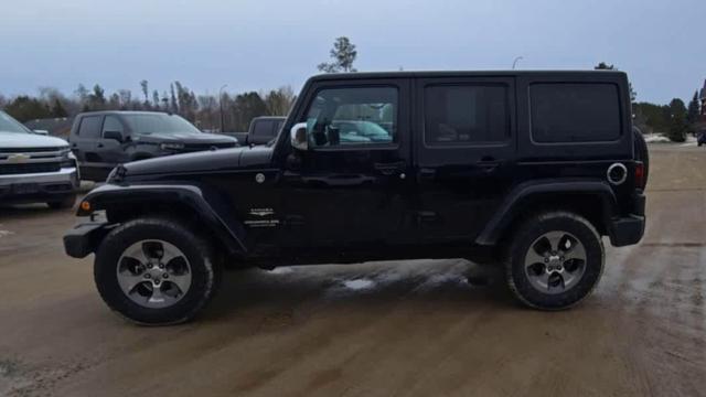 used 2013 Jeep Wrangler Unlimited car, priced at $18,480