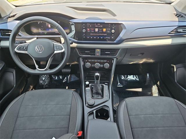 used 2024 Volkswagen Taos car, priced at $26,000